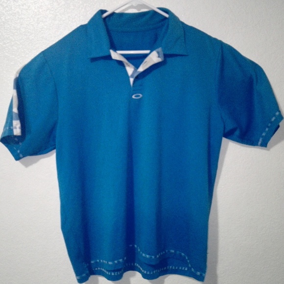 Oakley Other - OAKLEY Blue Polo Shirt Spell Out On Back